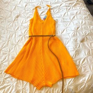 NWOT. Gold deep V sweater romper size xs